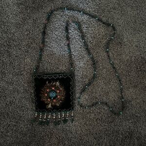 Dark green velvet beaded purse